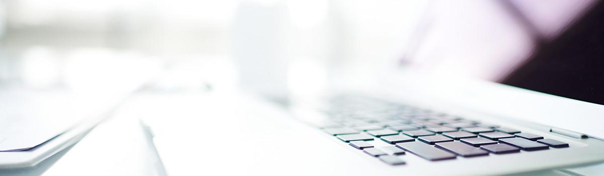 Header-Grafik Download: ein aufgeklapptes Notebook